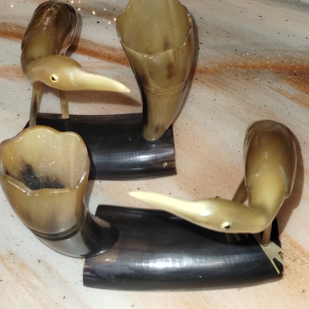 Elegant Horn Bird Sculptures